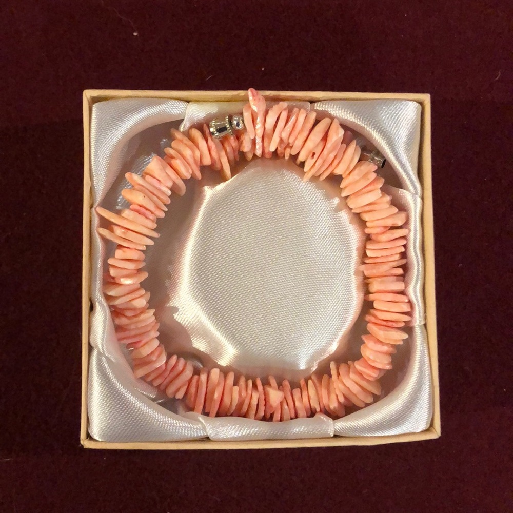 Coral colored puca shell anklet